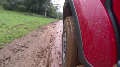 pov rear truck tire driving on muddy road