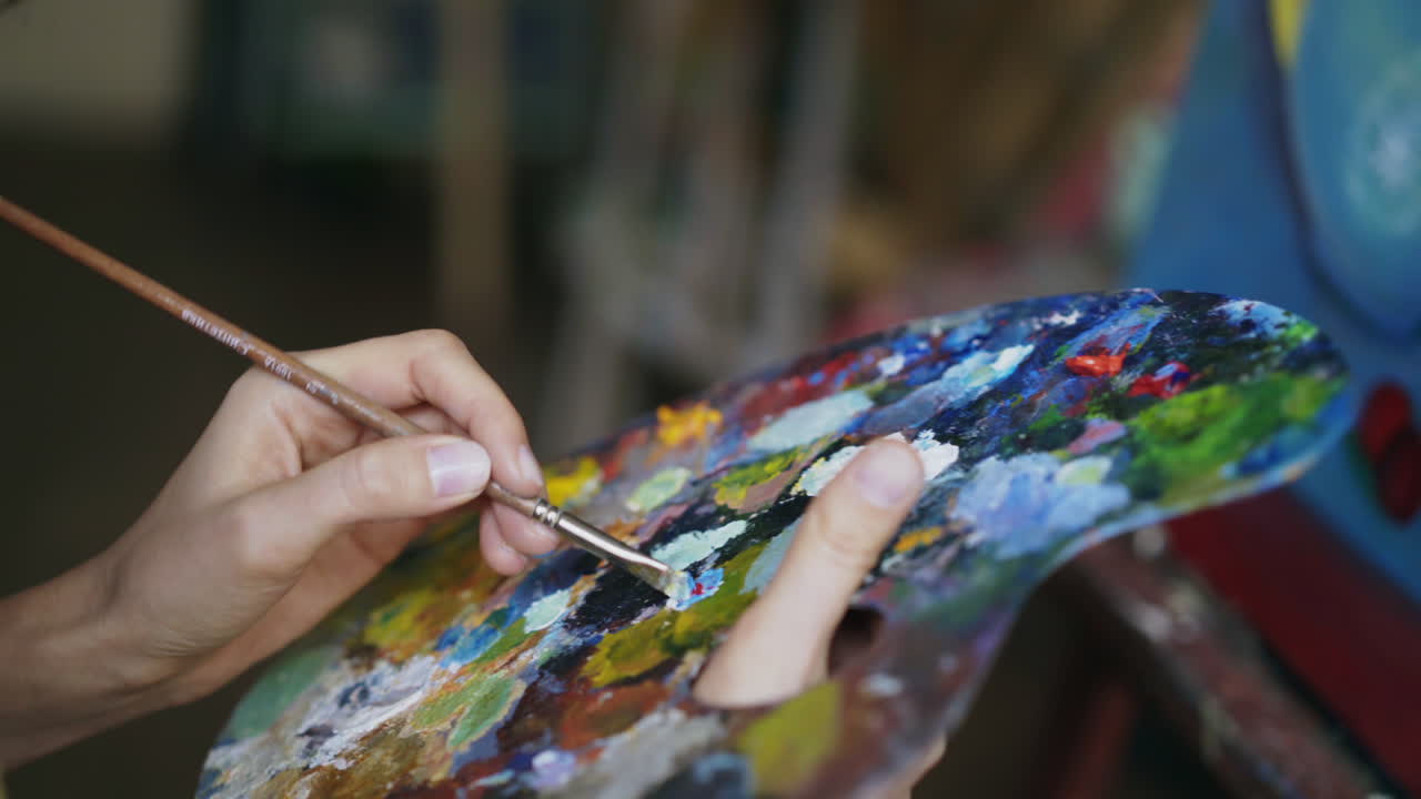 Artist painting a still life