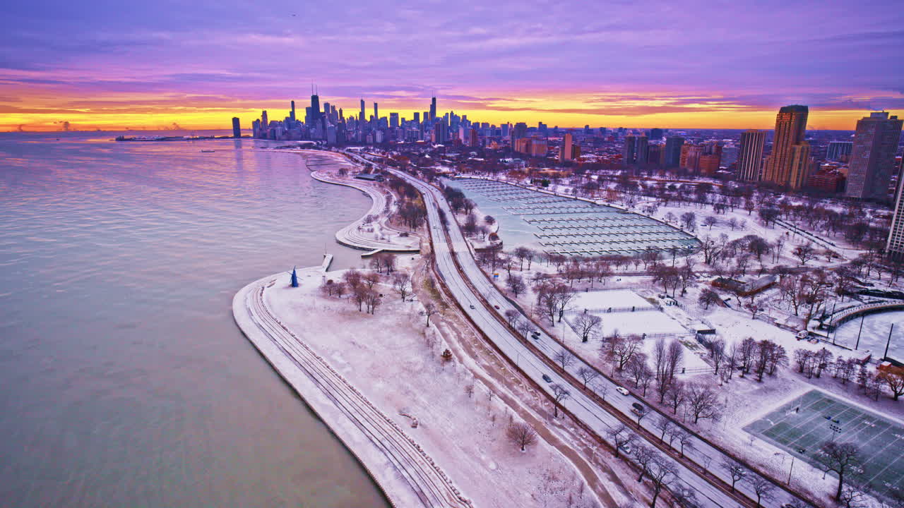 Cinematic drone shot of Chicago's loop in winter at dawn
