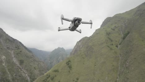 drone flying over mountains