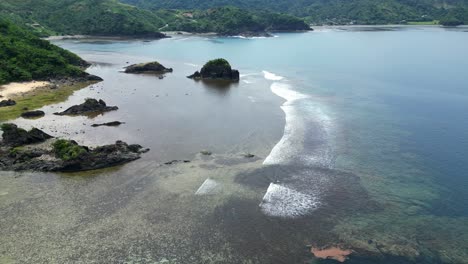 idyllic scenery of beach in puraran, baras, catanduanes, philippines - aerial drone shot