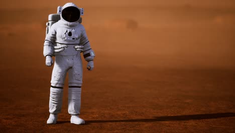 astronauta en la superficie de marte. planeta rojo cubierto de gas y roca