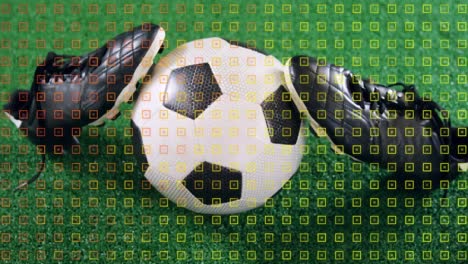 Animation-of-gold-confetti-falling-over-soccer-ball-and-whistle