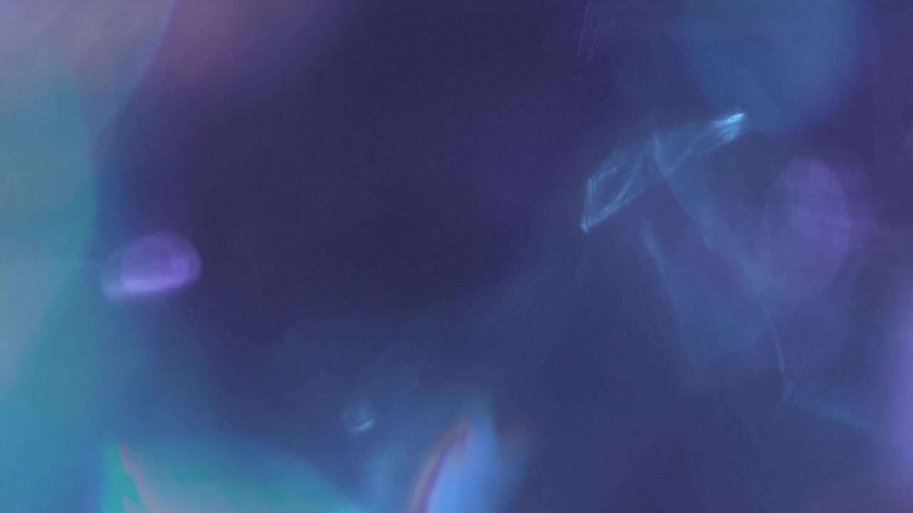 Abstract Light Leaks and Bokeh Overlay with Purple and Blue Tones