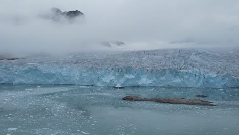 Glaciers-close-up-in-slow-motion-on-the-northern-coastline-of-the-Svalbard-Archipelago-in-the-Artic-Sea