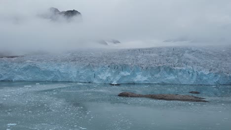 glaciers close up in slow motion on the northern coastline of the svalbard archipelago in the artic sea