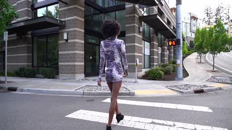 black sexy woman wears sensual short purple dress