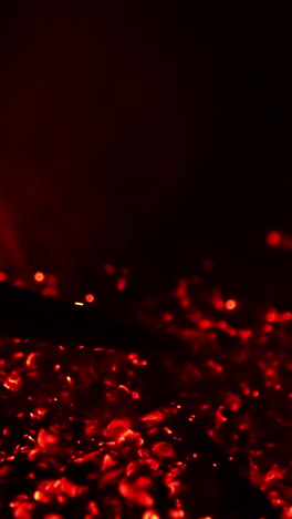 red heat on black background. fireplace explosion slow motion.