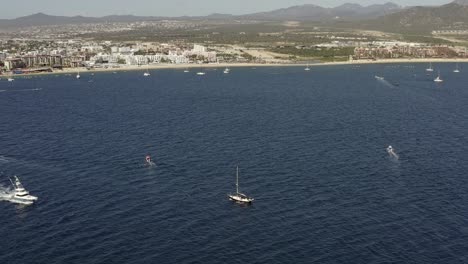 Cabo-San-Lucas-Mexico,-Aerial-View-on-Famous-Riviera-Beach-and-Boats-in-Pacific-Ocean