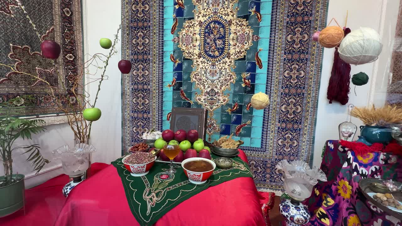 Blue wall artistic furniture of colorful tile Persian carpet decoration table design Haftsin ceremony Nowruz tradition spring urban landscape Tehran architecture festive candles culture arrangement