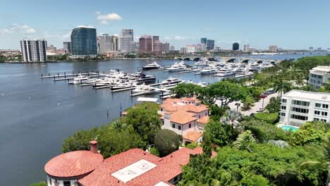 aerial push into west palm beach over marina along the intracoastal waterway