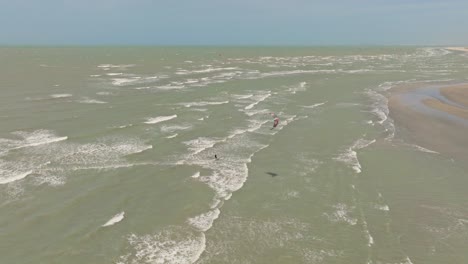 Kitesurfer-riding-towards-the-beach-in-Brazil