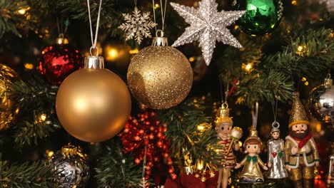 close-up of a decorated christmas tree with various ornaments and lights