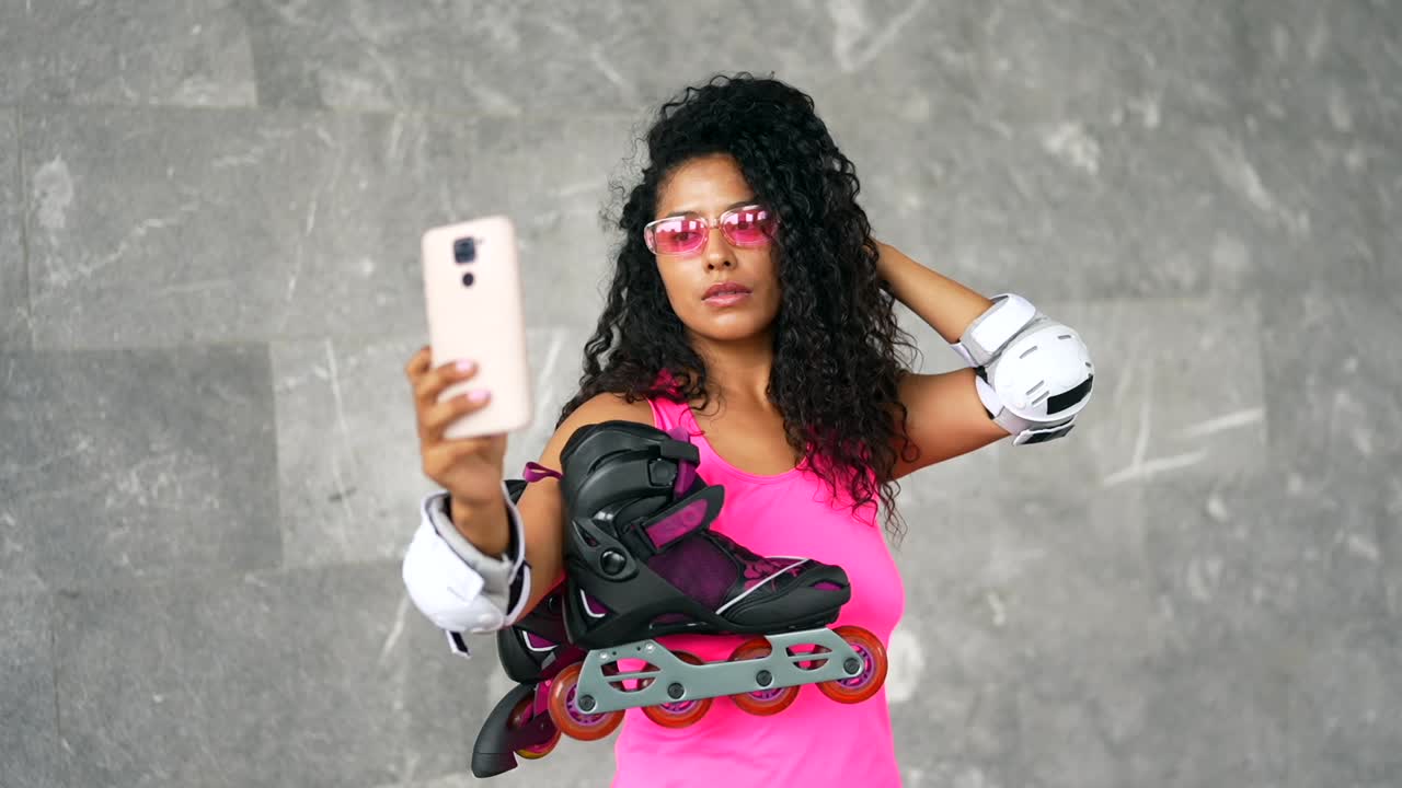 Woman taking a selfie with roller skates