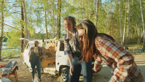 Girlfriends-Dancing-at-Campsite