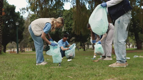 group of volunteers cleaning up a park