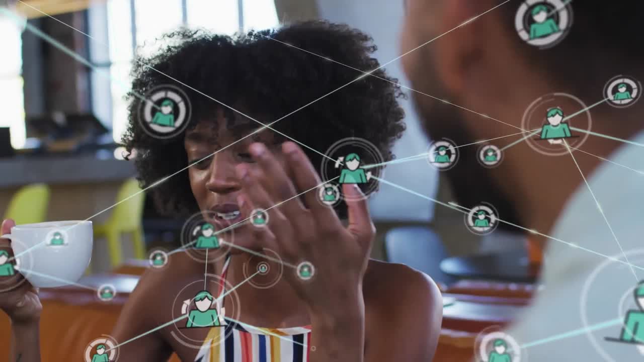 Animation of social media connections and icons over diverse business people