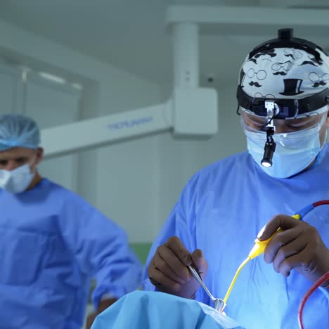 doctor during surgery. doctor concentrating on patient during surgery