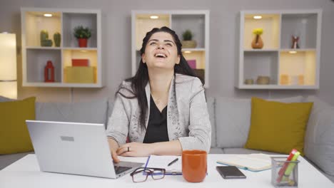 Home-office-worker-woman-says-wow-to-camera.