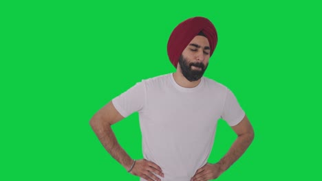 sick sikh indian man suffering from stomach pain green screen