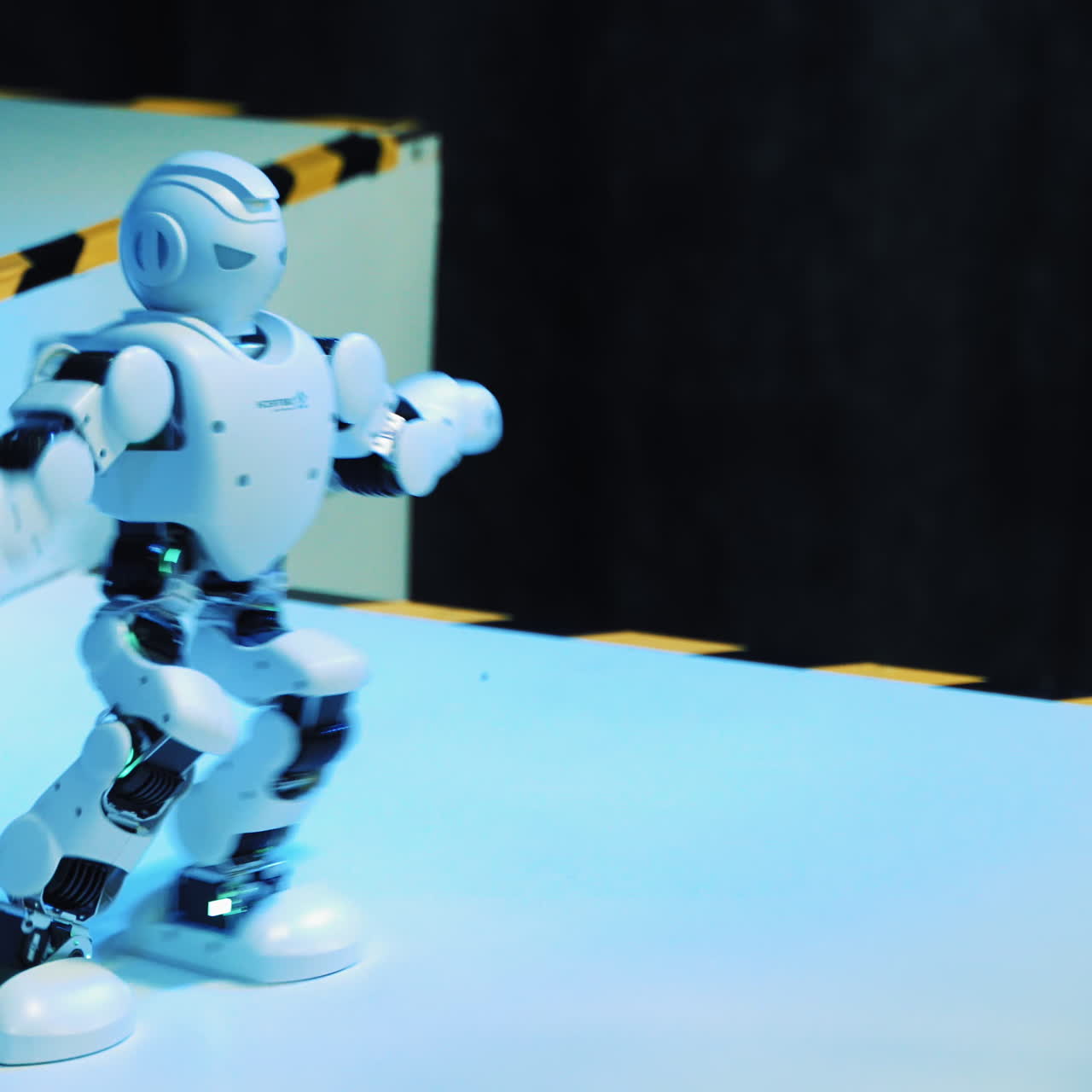 Dancing robot close up. Smart technology concept. Closeup of smart robots dance. Robotic dance party. Dancing robot humanoid. Dancer robot man