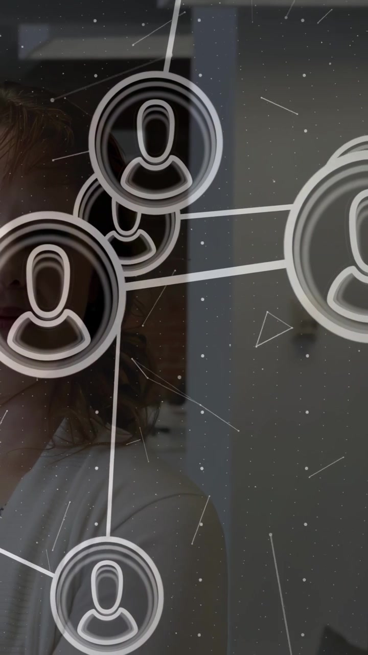 Vertical video: Network UI showing nodes on tilt, grouping links over her reflection for tech