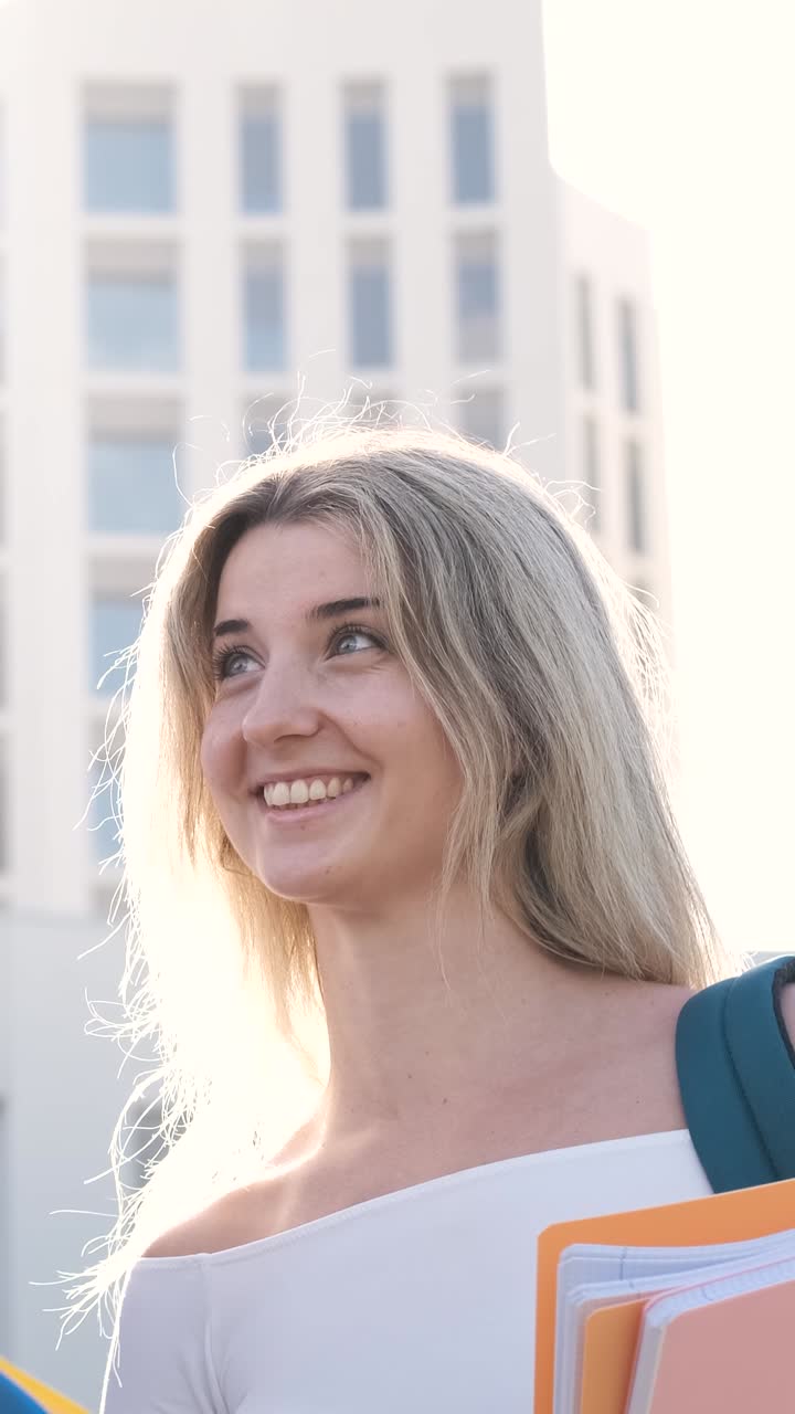 Happy student girl smiling walking outdoors