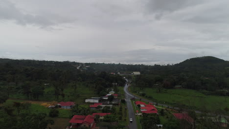 aerial shot rising to reveal rural costa rica central america small town