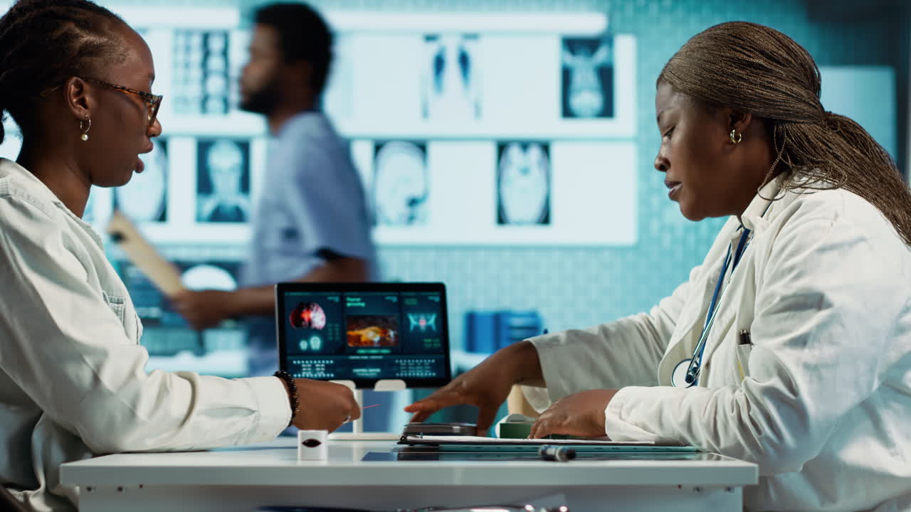 Black female patient buying medicaments and vitamins on POS terminal