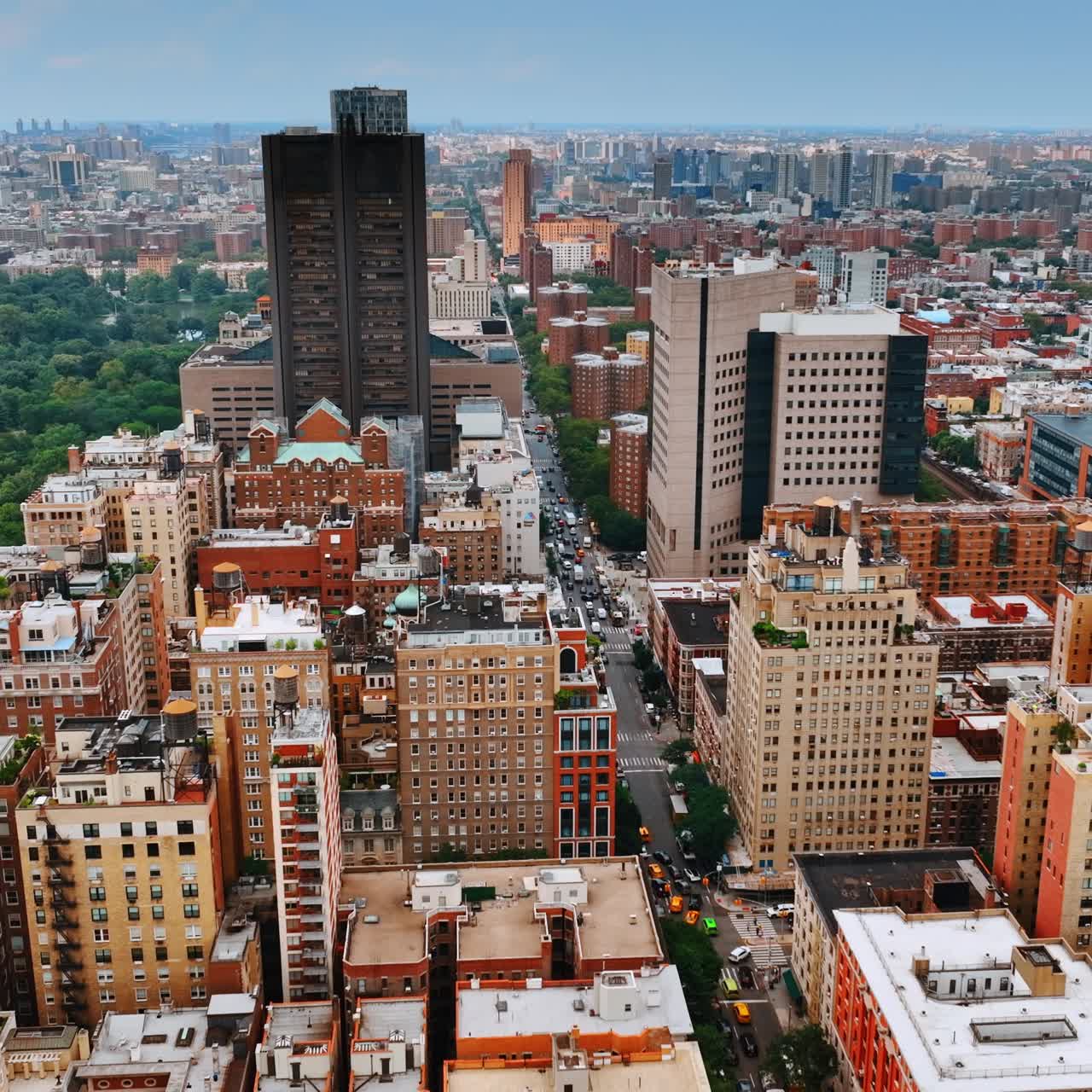 New York city district with residential house. Beautiful green park scattered nearby the gorgeous buildings. Top view