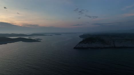 Viksoy-and-Oygarden-coastline-to-North-Sea,-Aerial-at-dawn