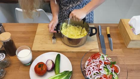 making mashed potatoes and salad