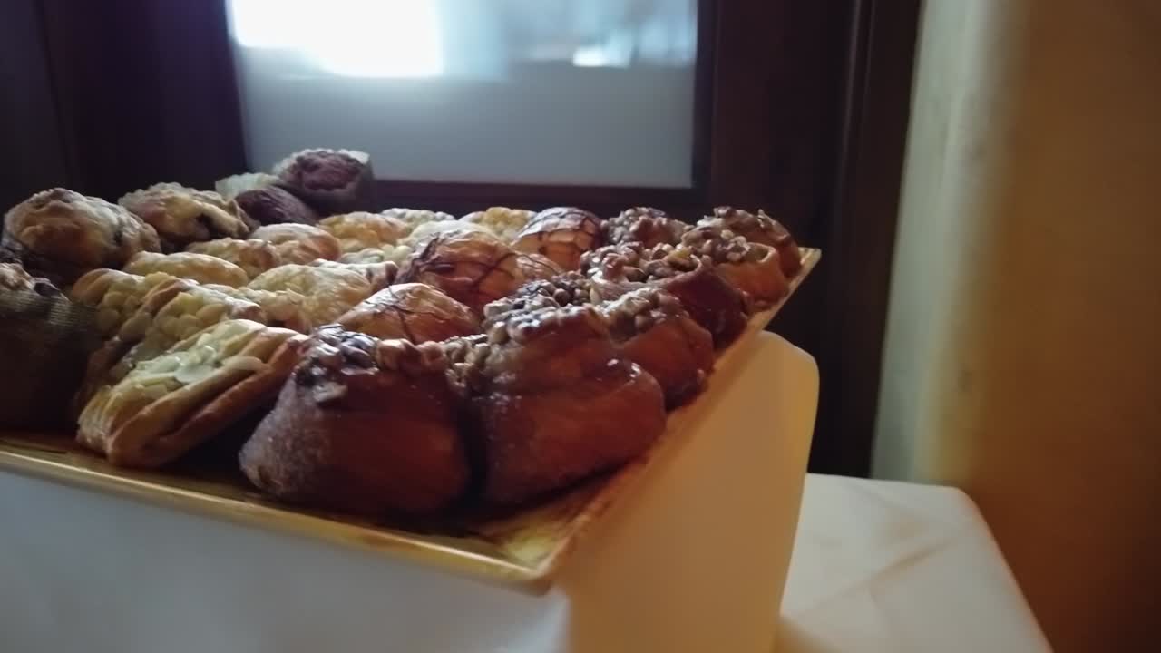 Pan of sweet treats laid out for a bridal shower.