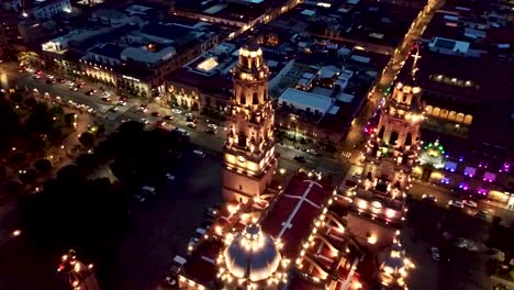 done´s flight over the cathedral of morelia, michoacan, mexico