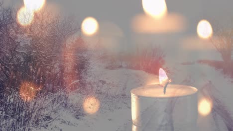 Animation-of-candles-over-winter-road-landscape