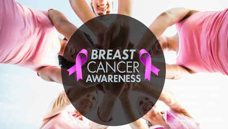 animation of pink ribbon logo with breast cancer text over diverse group of smiling women