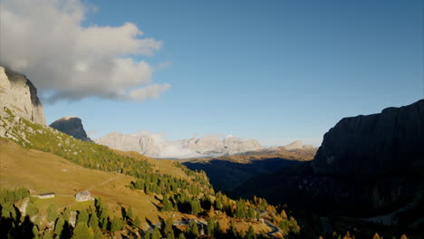 Aerial-Flying-Back-Over-Family-Overlooking-Val-Gardena-Valley-From-Ridge-Line