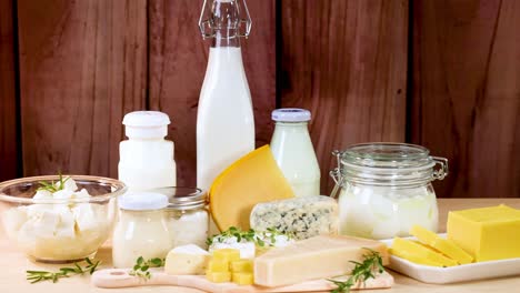 assorted dairy items displayed on wooden surface