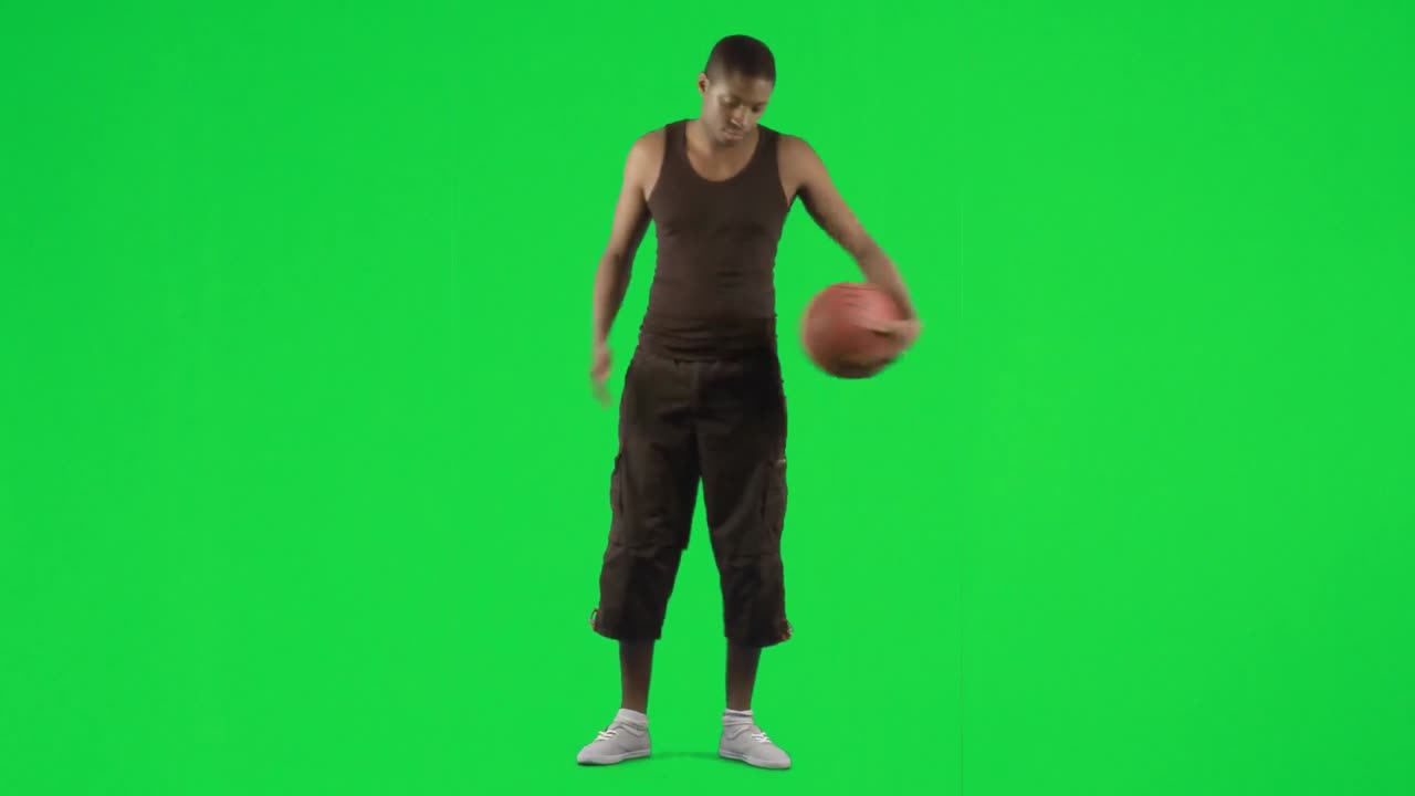 AfroAmerican basketball player footage against green screen