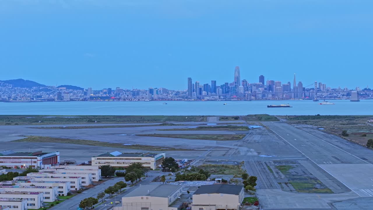 Sweeping aerial perspectives reveal Alameda Point’s open landscapes at twilight, where the San Francisco skyline looms in the distance. Shot on a DJI Air 3S.