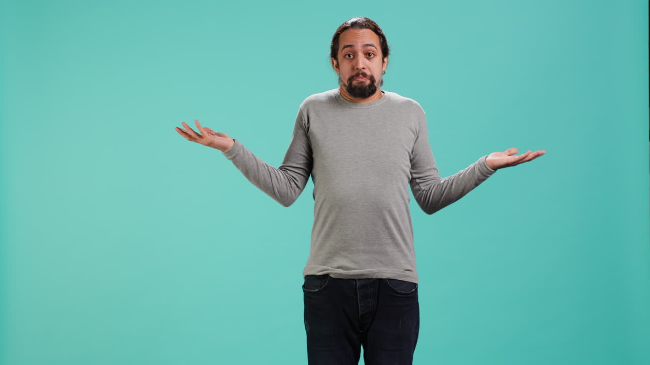 Man shrugging shoulders, unable to provide answer