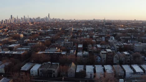 drone flying above north side chicago neighborhood on beautiful day at sunset
