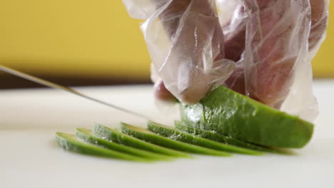 gentle avocado slicing close up