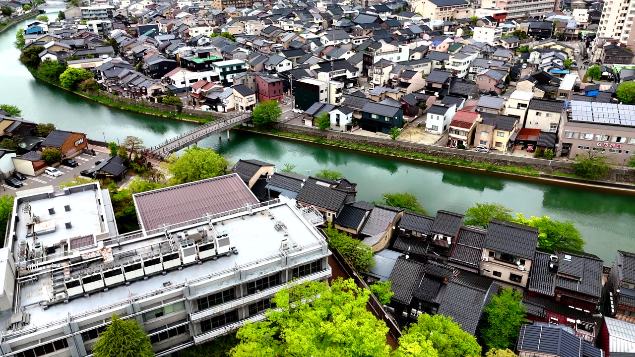 Kanazawa, Japan, drone show of Temple and river with bridge