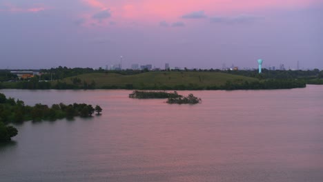 ascending 4k drone footage of bayou and southwest houston with downtown in distance