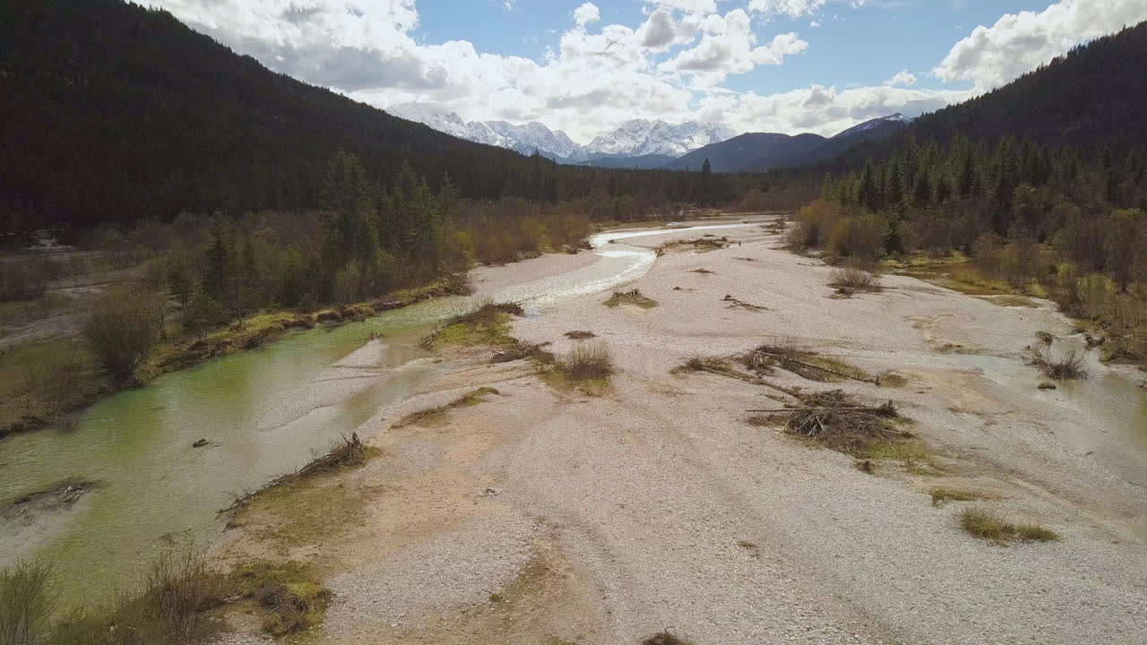 Aerial view following shallow river Isar terrain Hinterau valley Tyrol Austria