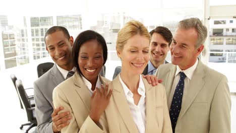 business people hugging each other