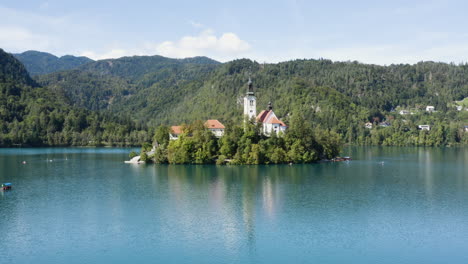 bled island with church and museum by lake bled at daytime in slovenia