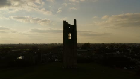 aerial view of st mary's abbey silhouette against the evening sky