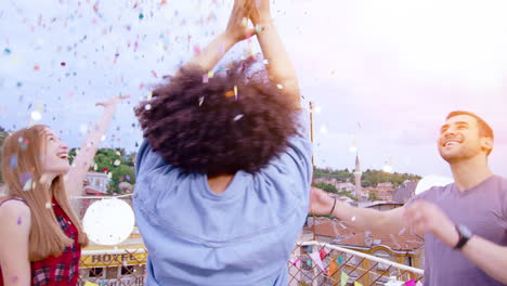 friends celebrate with confetti on